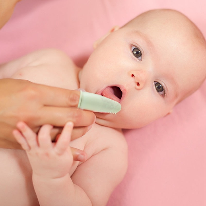 Escova dental massageadora - Canto da Criança